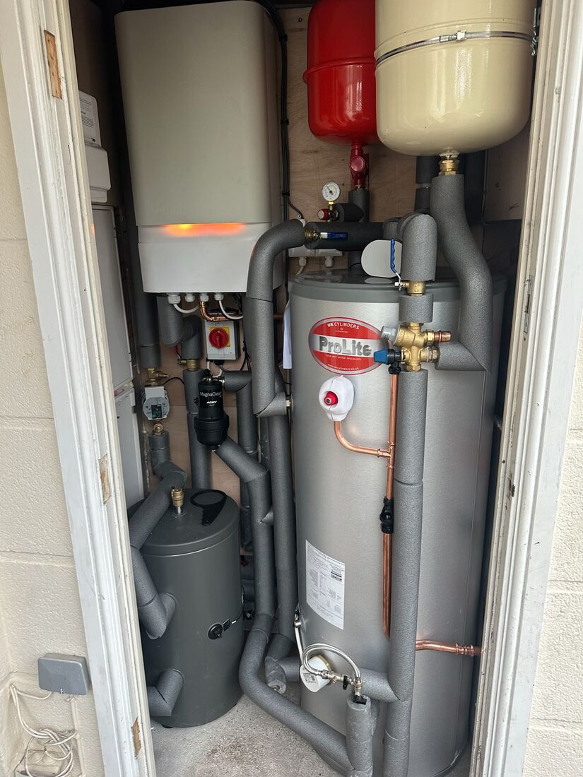 Unvented hot water cylinder installation in London by Qualis Energy